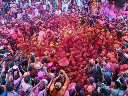 crowd-of-people-covered-with-bright-color-painting