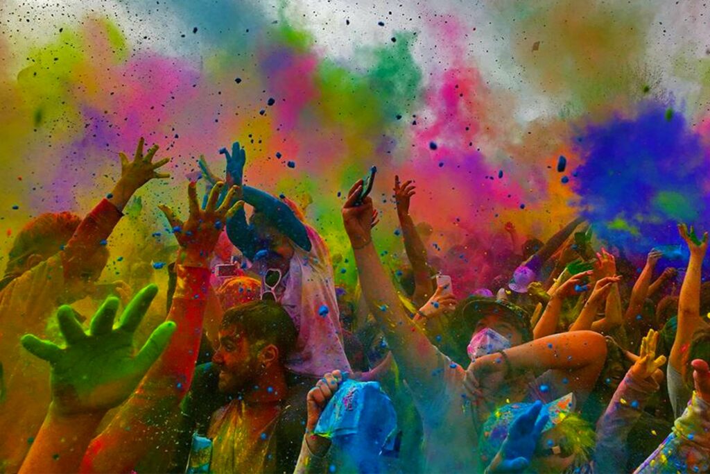 India Festival - happy-people-drenched-in-bright-colors-celebrating