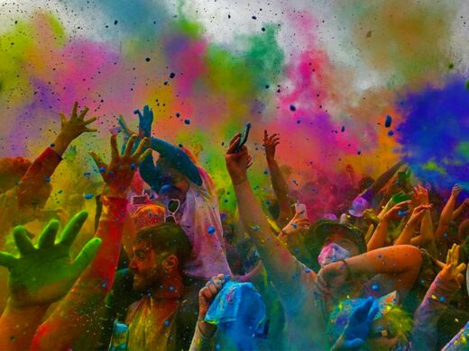 India Festival - happy-people-drenched-in-bright-colors-celebrating