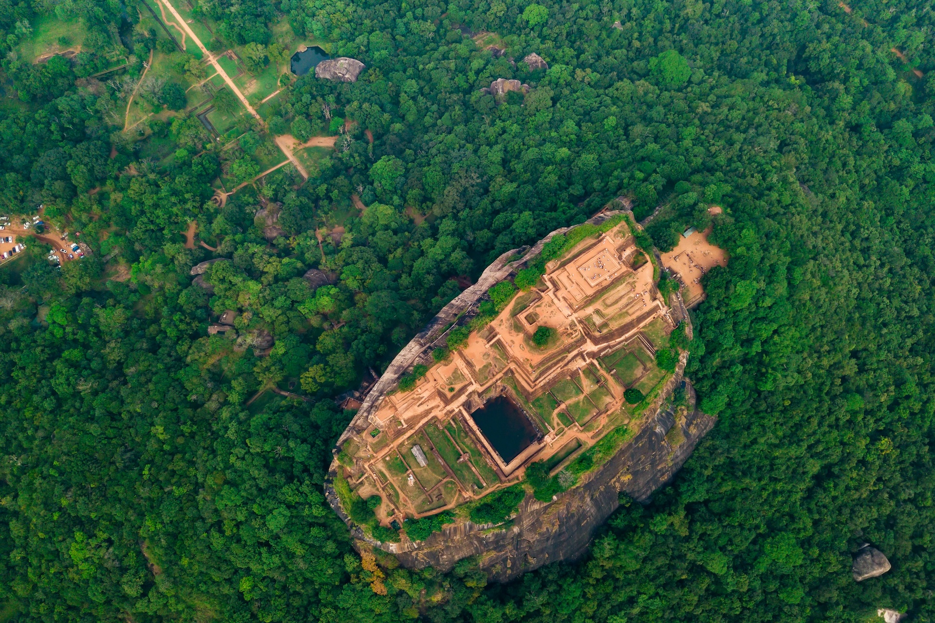 Aerial view of Sigiriya rock at misty morning, Sri Lanka. Drone footage.
