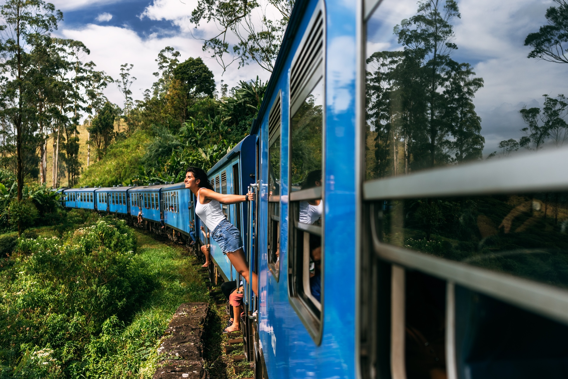 Traveling by train among mountains Sri Lanka